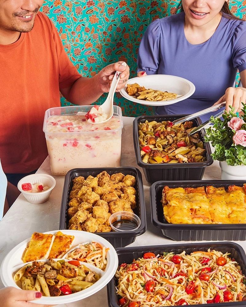 Guests serving themselves from a Halal mini buffet spread